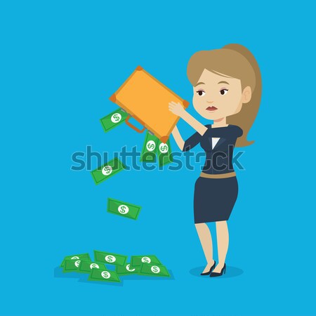 Bankrupt shaking out money from her briefcase. Stock photo © RAStudio