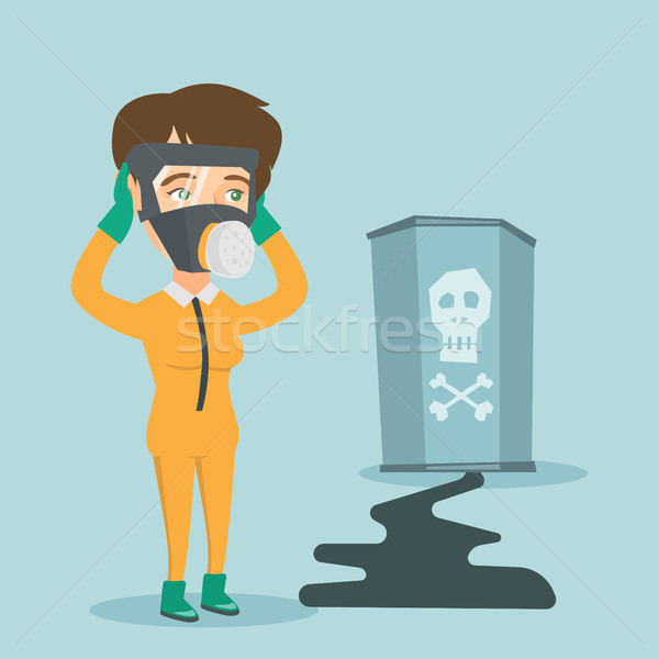 Concerned woman in respirator and protective suit. Stock photo © RAStudio