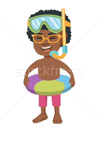Stock photo: Boy with inflatable ring, diving mask and snorkel.