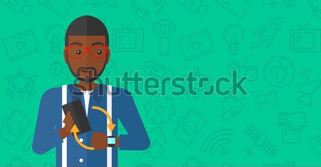 Synchronization of smartphone and smartwatch. Stock photo © RAStudio
