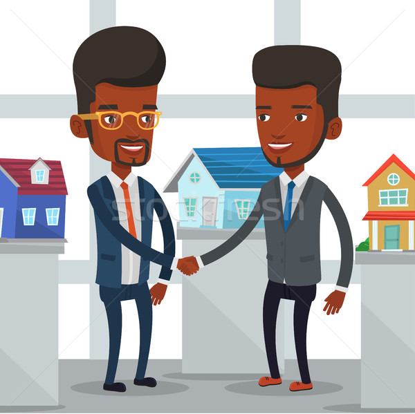 Acord tineri african agent imobiliar Imagine de stoc © RAStudio