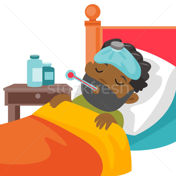 Young sick caucasain white boy laying in bed. Stock photo © RAStudio