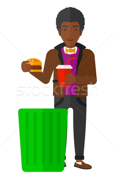 Férfi dob egészségtelen étel szemét tároló vektor Stock fotó © RAStudio