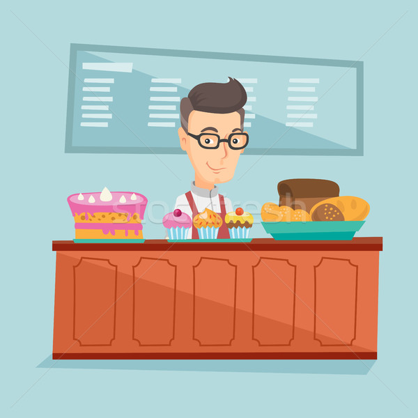 Worker standing behind the counter at the bakery. Stock photo © RAStudio