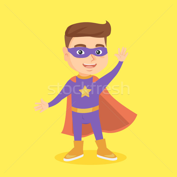 Caucasian boy playing in a superhero. Stock photo © RAStudio