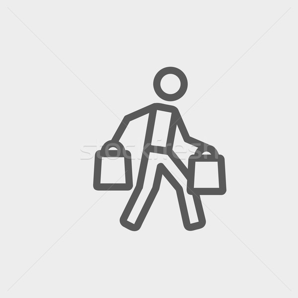 Stock photo: Man carrying shopping bags thin line icon