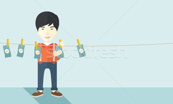 Chinese buisnessman hang his money. Stock photo © RAStudio