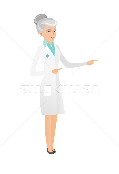 Supérieurs médecin pointant côté médicaux [[stock_photo]] © RAStudio