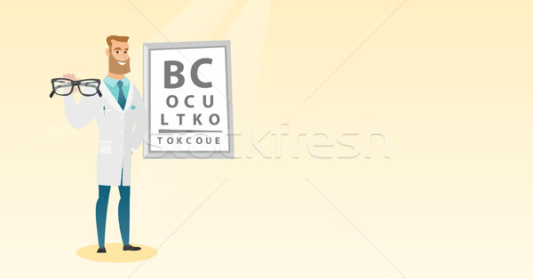 Professional ophthalmologist holding eyeglasses. Stock photo © RAStudio