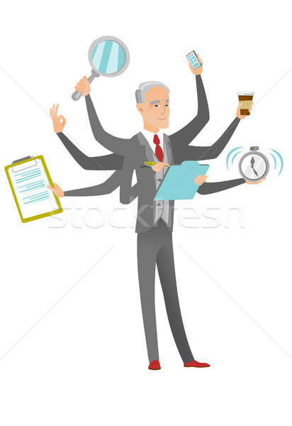 Caucasian businessman coping with multitasking. Stock photo © RAStudio