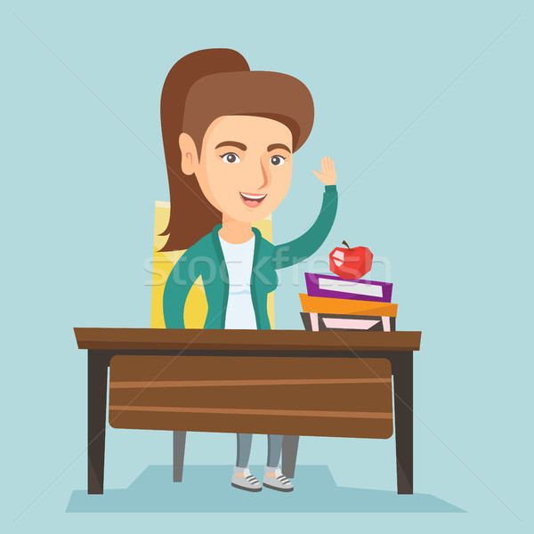 Student raising hand in class for an answer. Stock photo © RAStudio