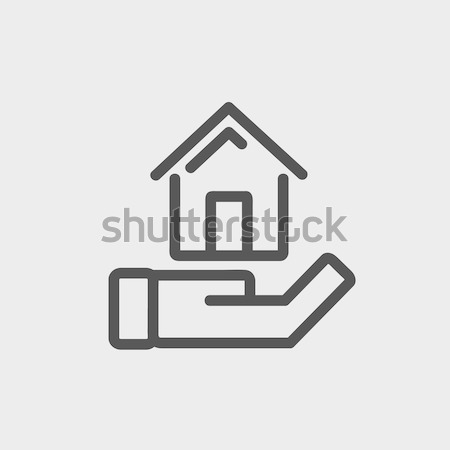 Hand holding house thin line icon Stock photo © RAStudio