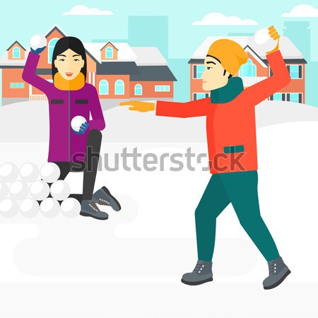 Couple playing in snowballs. Stock photo © RAStudio