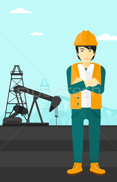Stock photo: Cnfident oil worker.