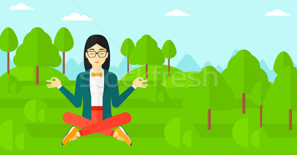 Business woman meditating in lotus pose. Stock photo © RAStudio