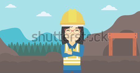 Stock photo: Female worker of solar power plant and wind farm.