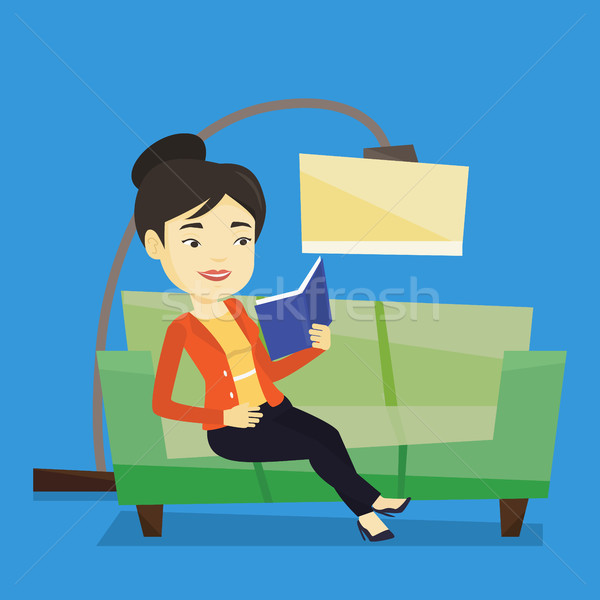 Woman reading book on sofa vector illustration. Stock photo © RAStudio