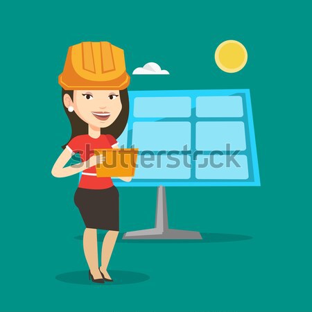 Female worker of solar power plant. Stock photo © RAStudio