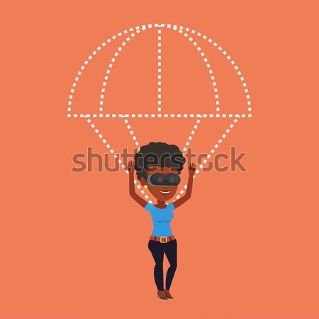 Happy man in vr headset flying with parachute. Stock photo © RAStudio
