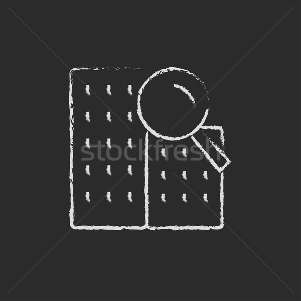 Condominium and magnifying glass icon drawn in chalk. Stock photo © RAStudio