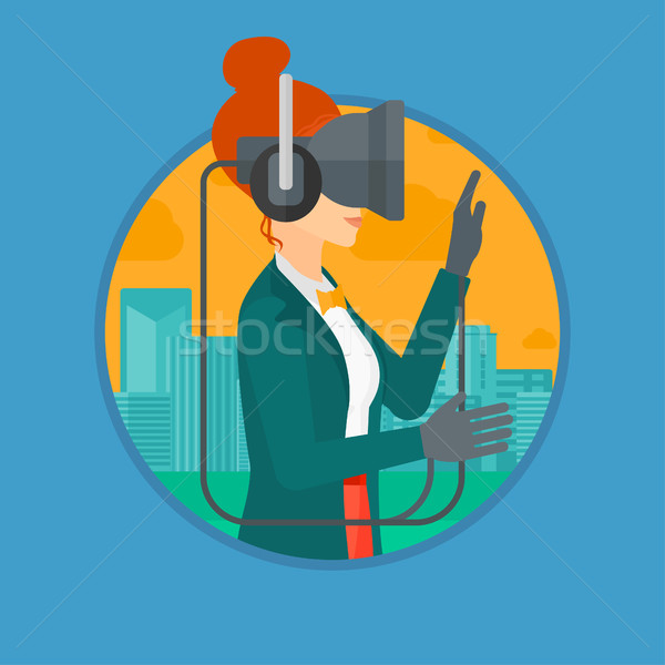 Woman wearing virtual reality headset. Stock photo © RAStudio