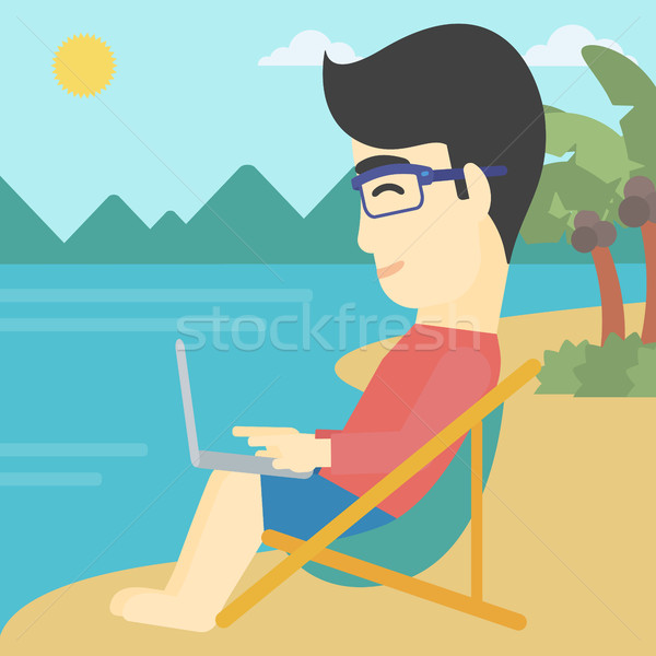 Businessman working on laptop on the beach. Stock photo © RAStudio