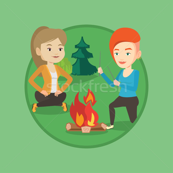 Deux amis séance autour feu de joie camping [[stock_photo]] © RAStudio