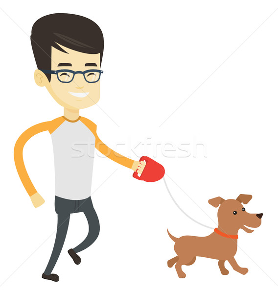 Young man walking with his dog. Stock photo © RAStudio