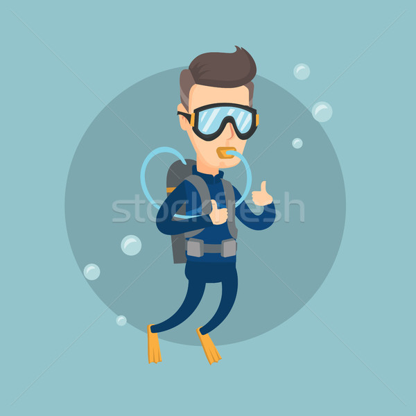 Man diving with scuba and showing ok sign. Stock photo © RAStudio