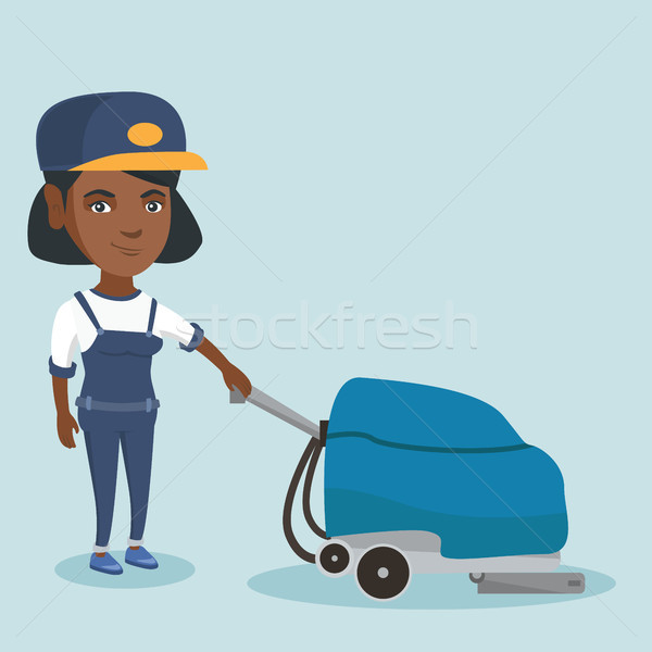 Woman cleaning the store floor with a machine. Stock photo © RAStudio