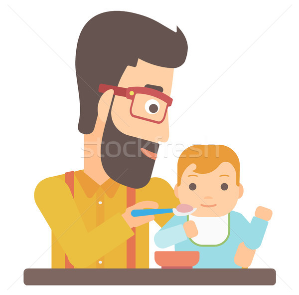 Man feeding baby. Stock photo © RAStudio