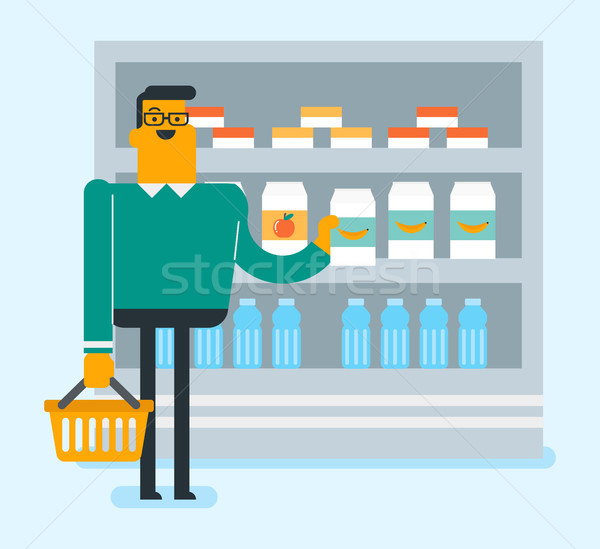 Caucasian man doing shopping in the supermarket. Stock photo © RAStudio