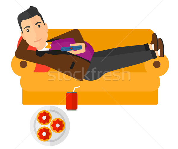 Man lying on sofa with junk food. Stock photo © RAStudio