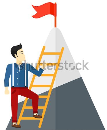Man climbing on mountain. Stock photo © RAStudio
