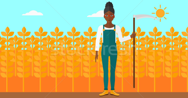 Farmer on the field with scythe. Stock photo © RAStudio