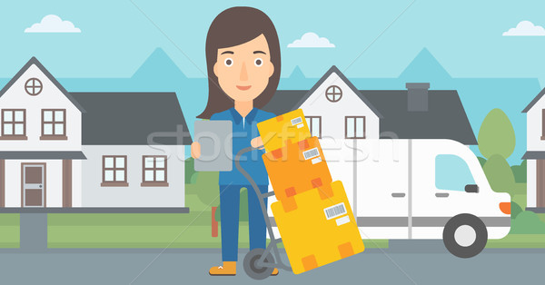 Woman delivering boxes. Stock photo © RAStudio