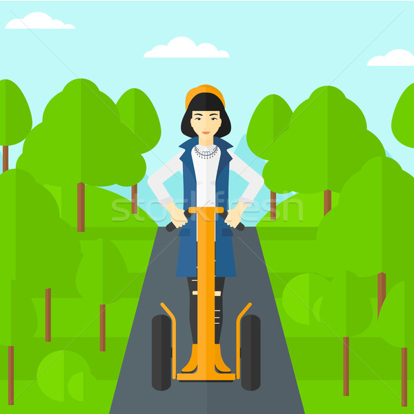 Woman riding on electric scooter. Stock photo © RAStudio