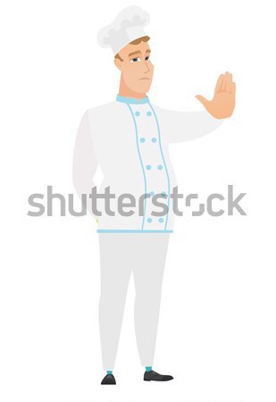 Caucasian chef cook showing stop hand gesture. Stock photo © RAStudio
