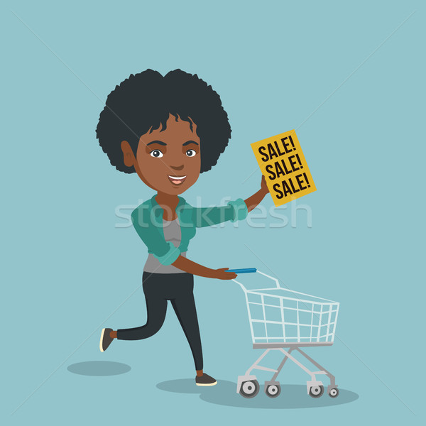 Stock photo: Woman running in a hurry to the store on sale.