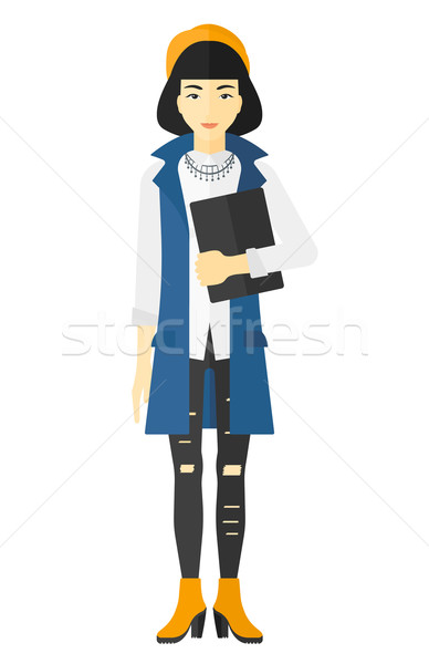 Stock photo: Woman holding digital tablet.