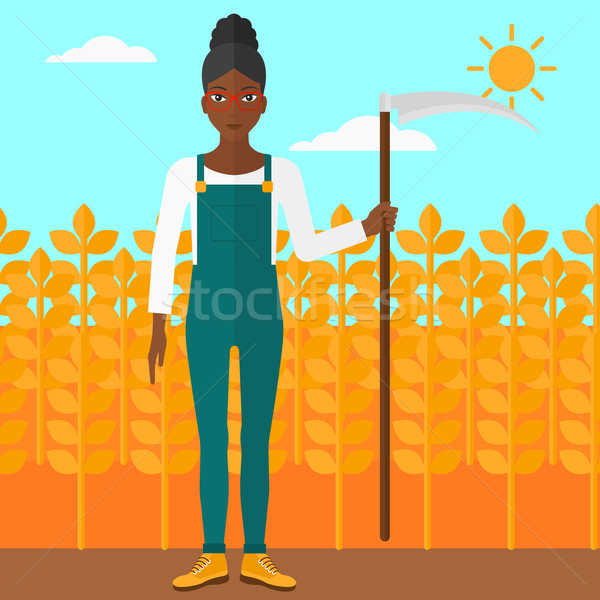 Farmer on the field with scythe. Stock photo © RAStudio