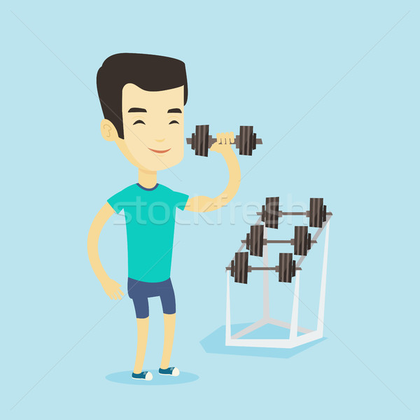 Férfi emel súlyzó ázsiai erős súlyemelő Stock fotó © RAStudio