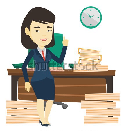 Smiling businesswoman pointing with her forefinger Stock photo © RAStudio