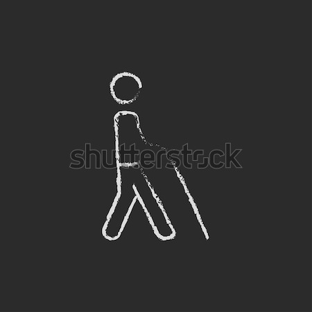 Man with cane icon drawn in chalk. Stock photo © RAStudio