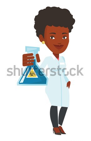 Scientist holding flask with biohazard sign. Stock photo © RAStudio