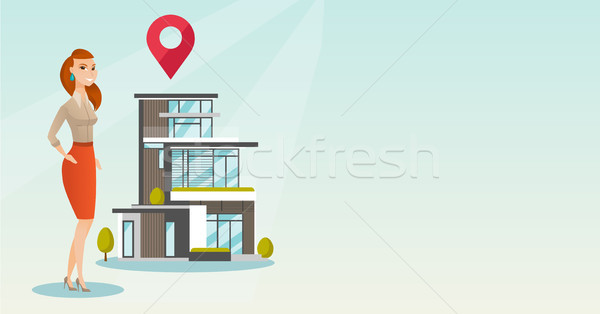 Realtor on background of house with map pointer. Stock photo © RAStudio