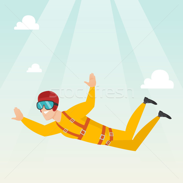 Caucasian parachutist jumping with a parachute. Stock photo © RAStudio