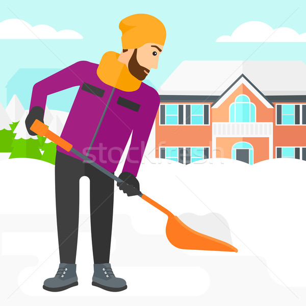 Man shoveling and removing snow. Stock photo © RAStudio