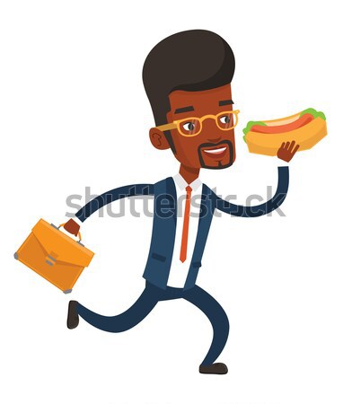 Businessman eating hot dog on the run. Stock photo © RAStudio