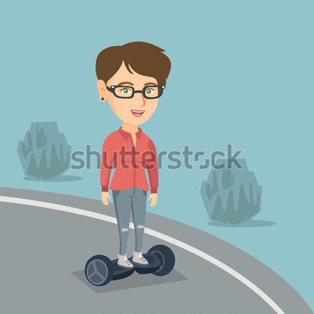 Woman riding on self-balancing electric scooter. Stock photo © RAStudio